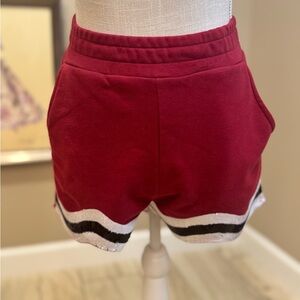 QUEEN OF SPARKLES Garnet Red and Black Sequin Wavy Shorts